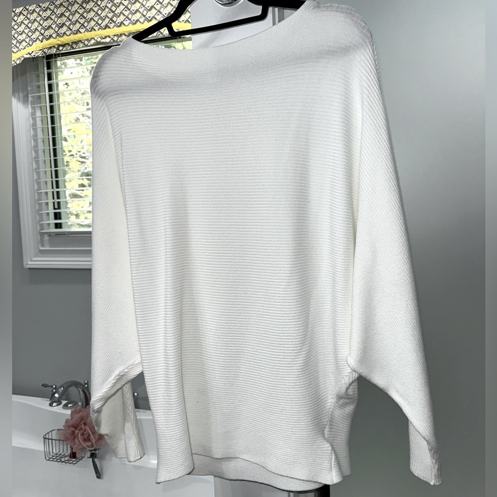 This sweet, and cozy sweater is perfect for church and outside cold gatherings.